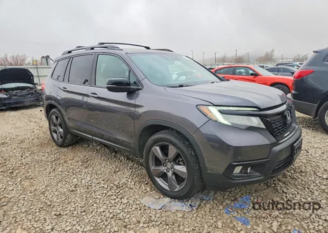 2020 Honda Passport Touring z USA, uszkodzony, nr VIN 5FNYF8H97LB011909